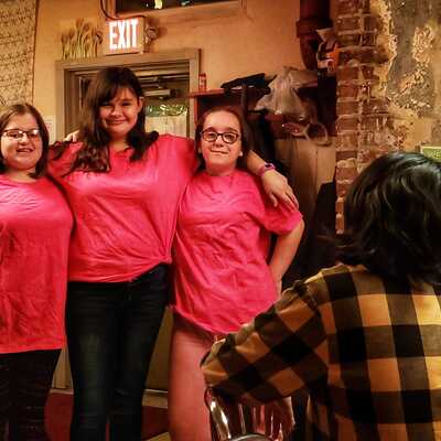 Meadville Area Teen Lounge friends decorate matching shirts.