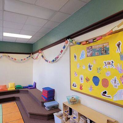 The view of our children's storytime & play area during 2023's summer reading program