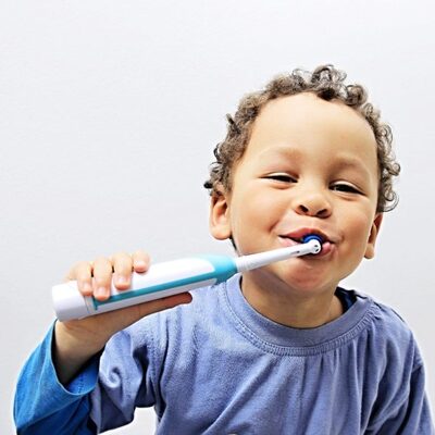 Smile Kits for National Dental Health Month with tips for brushing your baby and toddler teeth.
