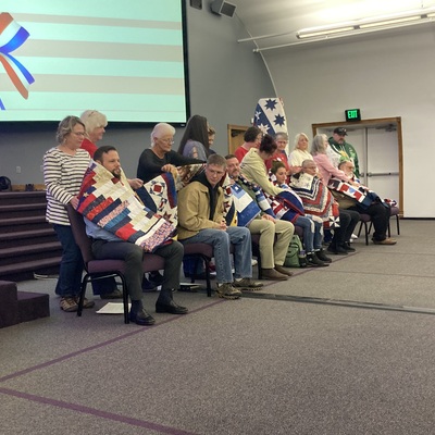 A recent group presentation where we awarded 15 Veterans with their Quilt of Valor