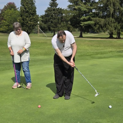 Participating in our golf outing