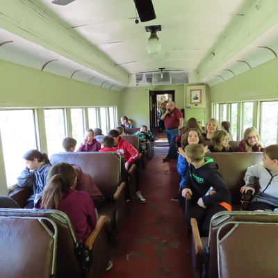 Students hear the history of Oil Creek Valley during the train ride.