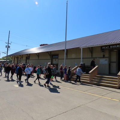 Students arriving at Perry Street Station
