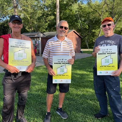 French Creek Recreational Trails, Inc Board members w/ EBO hotspot signs for the Ernst Trail