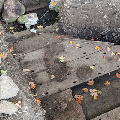 A hand-drilled wooden box for filtering tanning liquids, found during an archaeology dig at the site