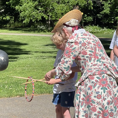 History Summer Camp learning colonial era games.