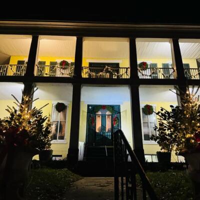 Baldwin Reynolds House exterior decorated for Trees of Christmas 2024