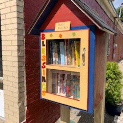 We provide a free books,  Book Box is located outside our building on Central Ave.