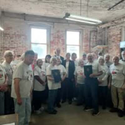 Toy Shoppe of Warren volunteers receiving 25-year commendations