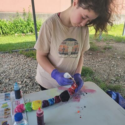 Tie Dyeing during 2022's Art It Up! Programming Series, funding through NWPA's ReMake Learning Days